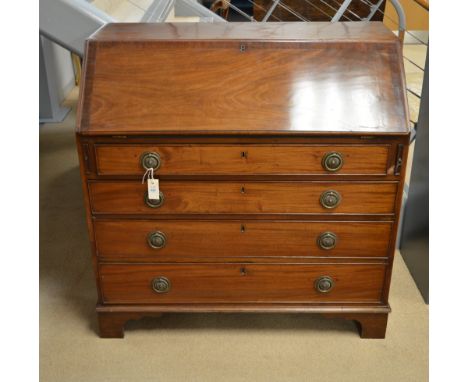 A George III mahogany bureau, the fall-front enclosing a fitted interior of drawers and pigeon holes and green baize writing 