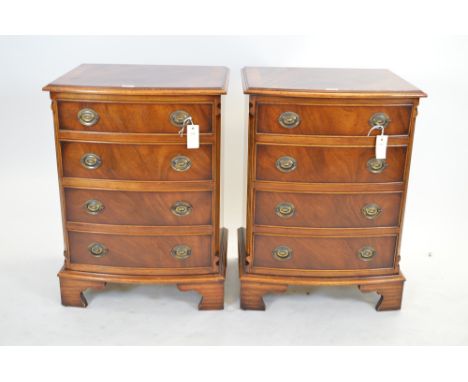 A pair of Chapman mahogany bowfront chest of drawers, each with an arrangement of four graduated drawers on shaped bracket fe