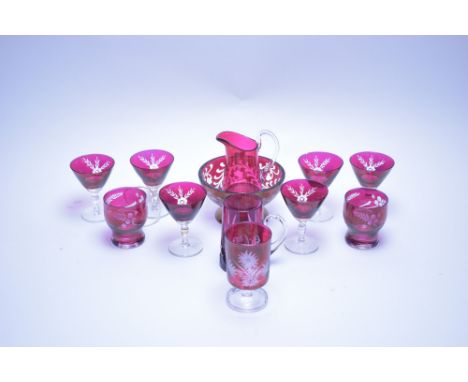 Mixed ruby glass, to include: six liqueur glasses; a jug; a cut glass tankard; a dish; a goblet; and two further glasses.