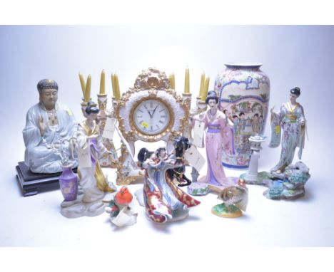 Mixed china figurines; makers to include the Franklin Mint; a modern mantel clock and candelabra garnitures; a satsumaware va