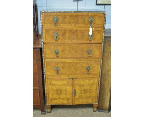An early 20th Century rosewood and burr walnut chest of drawers by Kean &amp; Scott, Birmingham, the caddy top above an arran