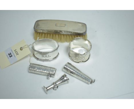 Silver items to include: a napkin ring with Lindesfarne pattern rims; another napkin ring; two charoot holder cases; a charoo