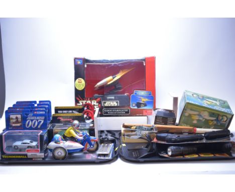 A collection of toys to include; Corgi James Bond gyrocopters; Jaguar XKR; Aston Martin DB5;, Aston Martin Vanquish; James Bo