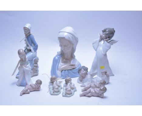 Seven Lladro figures; together with three Nao reclining cherubs.