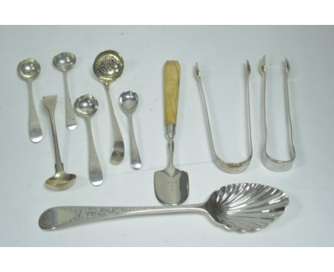 A selection of silver spoons and flatware, mostly Georgian, including: table spoon with later fluted bowl and engraved handle