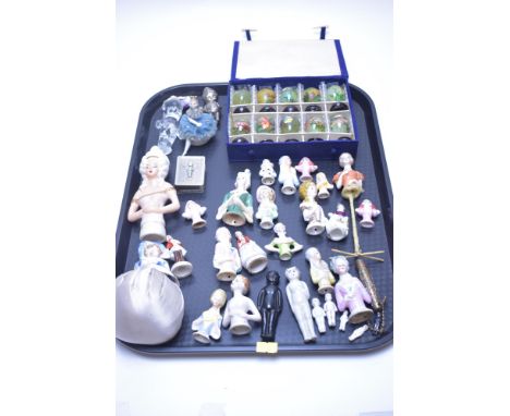 A group of approximately twenty porcelain pin dolls, together with other small ceramic figures; and an Oriental box containin