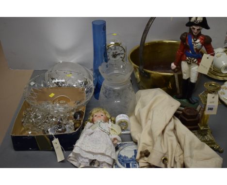 A cast metal candlestick; a brass bucket; a silver plated tureen; a bisque headed doll; a blue and white tile inscribed "Joha