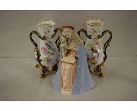 A pair of hand painted 20th Century vases (missing covers); together with a Hummel Madonna and Child.