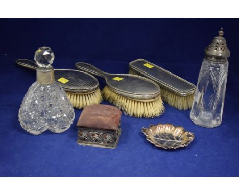 A silver mounted pin cushion of Arts and Crafts design, by William Hutton & Sons, Birmingham 1902; together with a cut glass 