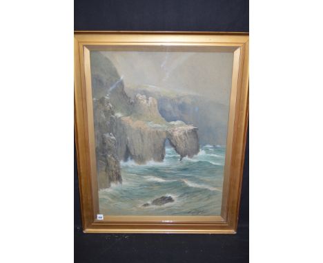 A watercolour, by Thomas Swift Hutton - A rocky coastal scene, signed.