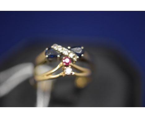 A sapphire and diamond ring, in cross-over setting; together with a ruby and diamond ring in wishbone setting, ring size O.