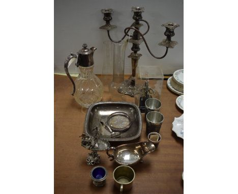 A Silver-plated and cut glass claret jug; a silver-plated three branch candelabra; a pair of pewter tankards and other items.