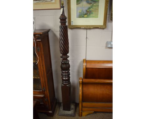 A standard lamp made from a 19th Century mahogany bedpost column.