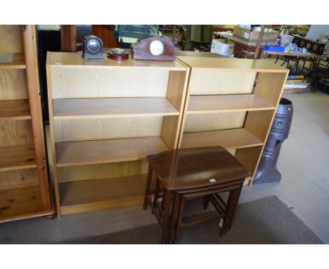 A pair of modern oak veneered open bookcases, 80cms wide; a nest of three stained wood rectangular coffee tables, 60cms; a ma