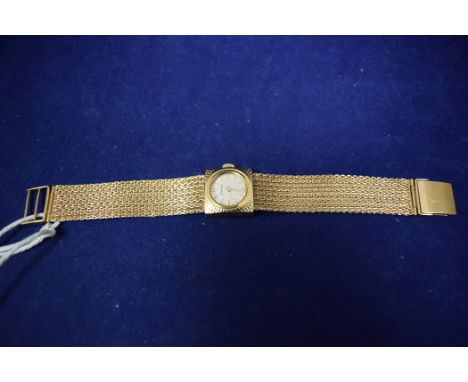 A 9ct. yellow gold cased Nivada cocktail watch, fitted manual wound movement on a mesh strap, 22grms gross.