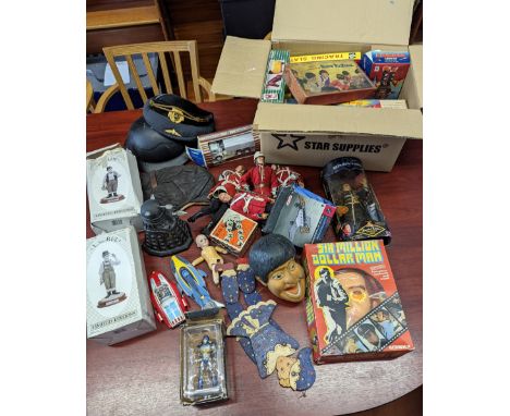 A collection of toys, dolls, modes, military hats, vintage board games etc.