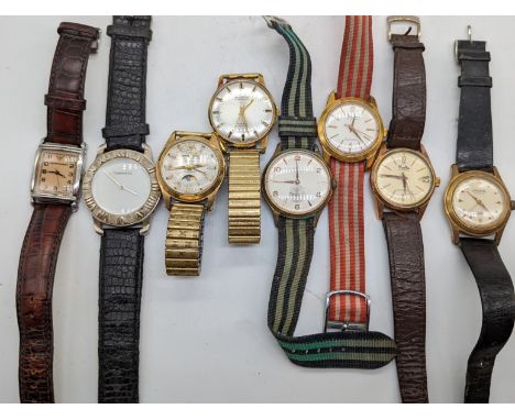 A collection of 8 gents vintage watches