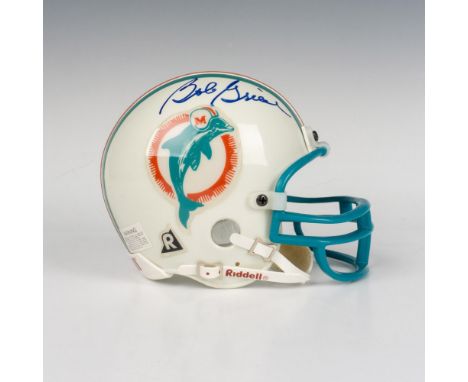 This collector's mini helmet from Riddell is autographed on the side by Hall of Fame inductee Bob Griese. This item has a ple