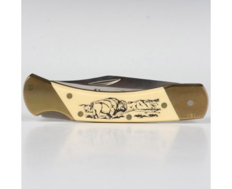 This limited-edition folding knife features nickel silver bolsters and liners, etched scales with a Bison illustration. Close