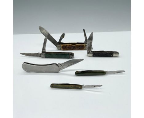 This collection includes a Camillus multi-tool with a 2.5" blade, a Case M1054 LSSP knife with a 2" blade, a 2-bladed knife w