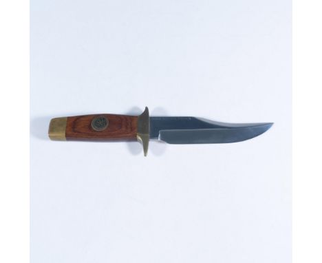 Bowie knife was designed by Blackie Collins and produced from a forged 440 series stainless steel. This item has its original