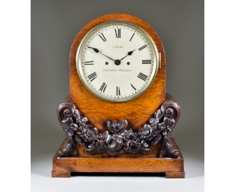 A William IV Pollard Oak Mantel Clock, by J Kent of Saffron Walden, the 8ins diameter circular painted metal dial with Roman 