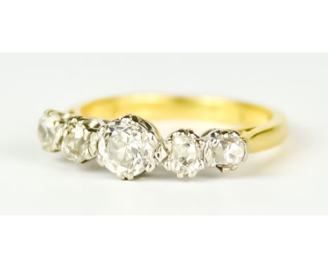 An 18ct Gold Five Stone Diamond Ring, Early 20th Century, set with brilliant cut white diamonds, approximately .75ct, size L,