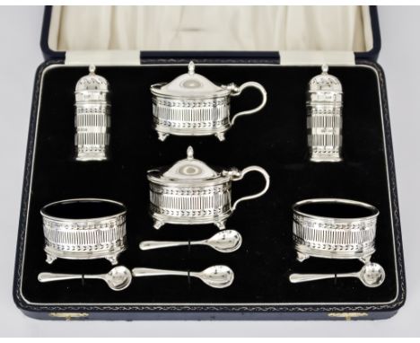 An Elizabeth II Silver Six Piece Oval Condiment Set of Neo Classical Design, by Mappin &amp; Webb, Birmingham, 1960, with mou