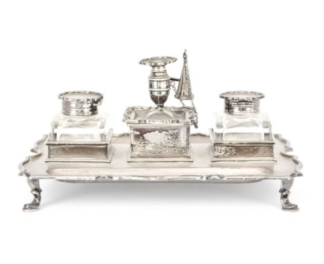 A Late Victorian Silver Rectangular Inkstand, by The Goldsmith and Silversmith Co. Ltd, London, 1900, with shaped and moulded