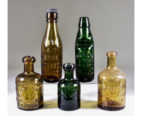 A Collection of English Glass Dumpy Seltzers, soda water, lemonade, ginger beer bottles and unmarked bottles of various tints