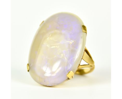 A Large Opal Ring, 20th Century, 18ct gold, set with an iridescent opal stone, 23mm x 28mm, size N, gross weight 8.8g