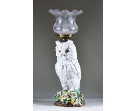 A Continental Porcelain Oil Lamp Modelled as a Long-Eared Owl, Circa 1880, with etched shade, 25ins high overall