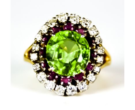 A Peridot, Diamond and Ruby Cluster Ring, Modern, yellow metal set with a centre faceted green peridot approximately 8.5ct, s
