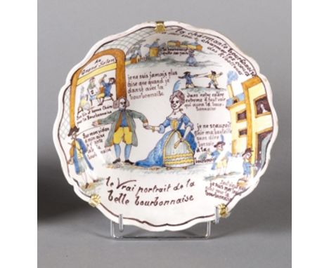 AUXERRE, XIXème siècle Jatte en faïence au motif d’un portrait de la belle Bourbonnaise D : 25,5 cm (Petites égrenures)