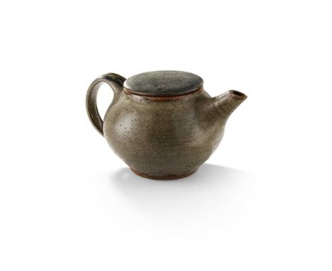 impressed pottery seal, stoneware with mottled green/gray glaze11.5cm high, 21.5cm wide (4.5in high, 8.5in wide)Provenance:La