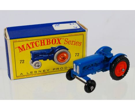 Matchbox - A boxed Matchbox Regular Wheels 72a Fordson Major Tractor. The model with blue body, silver grille, orange plastic