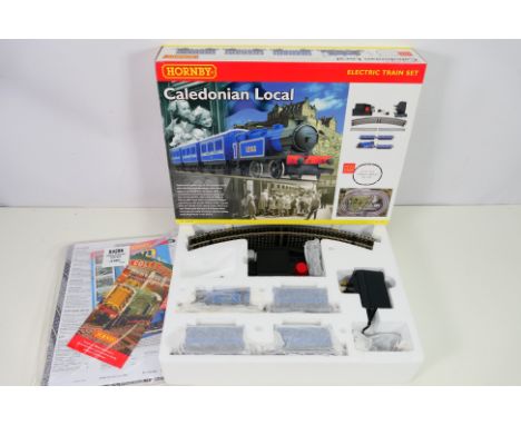 Hornby - A boxed Hornby R1016 OO gauge 'Caledonian Local' electric train set. The set appears to be in Mint condition with ma