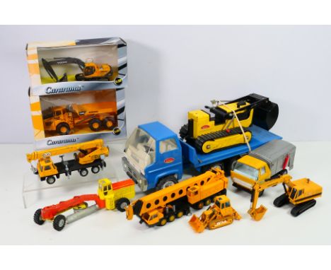 Tonka - Cararama - Dinky - NZG - A group of construction vehicles including an unboxed NZG Grove Crane, a boxed Volvo A40D Du