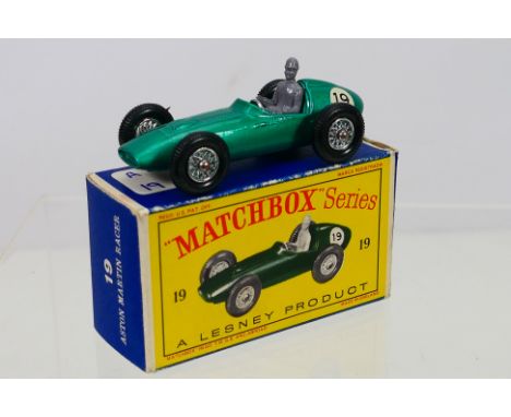 Matchbox - A boxed Matchbox Regular Wheels 19c Aston Martin DBR5. The model with metallic green body, black gloss base, wire 