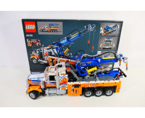 Lego - Lego Technic Heavy-Duty Tow Truck #42128 built set, with box and instructions, bags and some spares, pump action for a