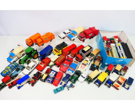 Corgi - Matchbox - Ertl - A collection of unboxed vehicles including Corgi Ford Transit Milk Float # 405, Jaguar 3.4 litre # 
