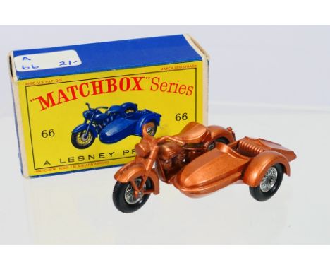 Matchbox - A boxed Matchbox Regular Wheels 66b Harley Davidson Motorcycle and Sidecar. The model in metallic bronze with spok