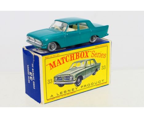 Matchbox - A boxed Matchbox Regular Wheels 33b Ford Zephyr III. The model with dark turquoise body features split rear silver
