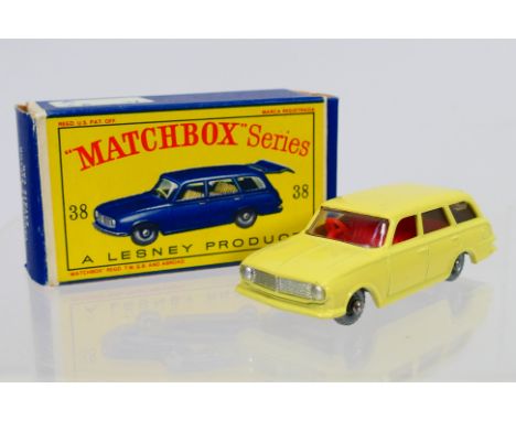 Matchbox - A boxed Matchbox Regular Wheels 38 Vauxhall Victor Estate. The model with Primrose body, clear glazing, red interi