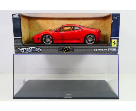 Hot Wheels - Auto Art - A boxed Ferrari F430 in 1/18 scale and an Auto Art display case. The car appears Mint in a Fair box w