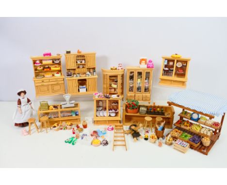 Dolls House Furniture - A collection of dolls house furniture to include a vegetable stall and many pieces with a bakery & ca