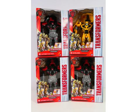 Transformers - 4 x Autobots Unite figures, Hot Rod # C3537 and Bumblebee # C3538. They appear unopened and Near Mint with onl