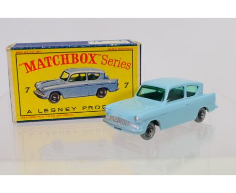 Matchbox - A boxed Matchbox Regular Wheels 7b Ford Anglia. The model with light blue body, green glazing, without silver trim