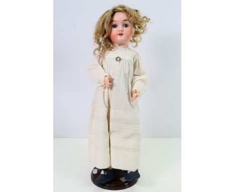 Max Handwerck - A bisque headed German doll of approximately 46 cm tall, marked 283 / 265 Max Handwerck Germany on the back o