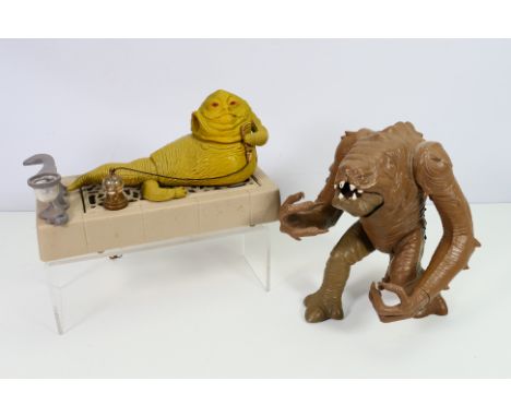 Star Wars - Kenner - An unboxed Star Wars 'Jabba the Hut' playset with an unboxed Rancor Monster. The Jabba playset comes wit